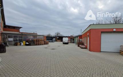 Na predaj veľký polyfunkčný obchodný priestor s rodinným dom a bytovými jednotkami v centre mesta - generujúci zisk