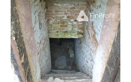 Vidiecky dom s veľkým pozemkom v peknom prostredí.