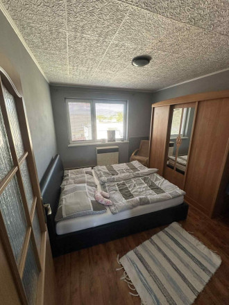 Exkluzívne na predaj priestranný 4-izbový byt s garážou a parkovacím miestom v tichej a príjemnej lokalite Topoľčany - Velušovce za super cenu - fotografia 3